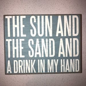 blue wooden distressed beach sign